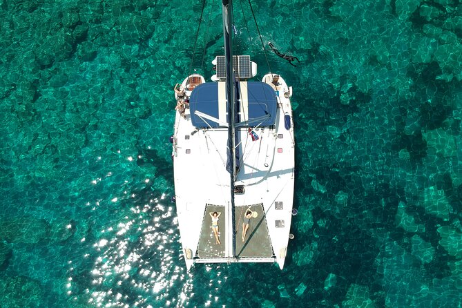Milos caves snorkelling Catamaran Cruise in a small group - Sikia Beach and Sykia Cave: Dinghy Runs and Ouzo Moments