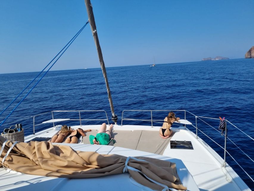 Milos: Full-Day Catamaran Cruise with Food and Open Bar - The Meeting Point and First Steps: Boarding TOGETHER in Adamantas