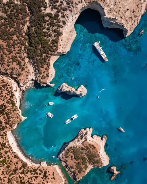 Milos: Full-Day Kleftiko Poliegos Sailboat Tour with Lunch - Kleftiko caves: the snorkeling highlight with towering cliffs