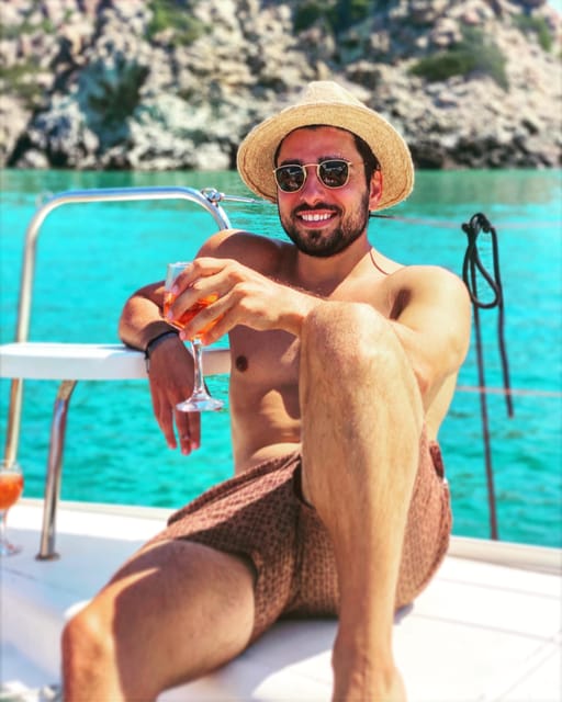 Milos: Full-Day Kleftiko Poliegos Sailboat Tour with Lunch - Gerakas Beach lunch and the Milos hot-spring moment