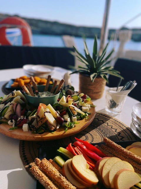 Milos: Kleftiko Sunset Catamaran Cruise with Meal & Drinks - Adamantas check-in and the “ready to sail” start