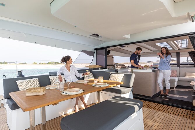 Mykonos: Brand-New Catamaran Cruise with Meal, Drinks & Transport - Lunch on Board: The Real Value Move