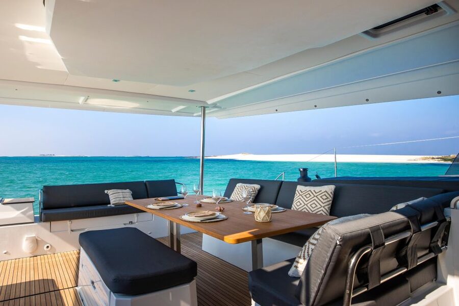 Mykonos: Catamaran Cruise with 3-Course Meal and Transfers - Aerial vs White Coral: what you get on the water