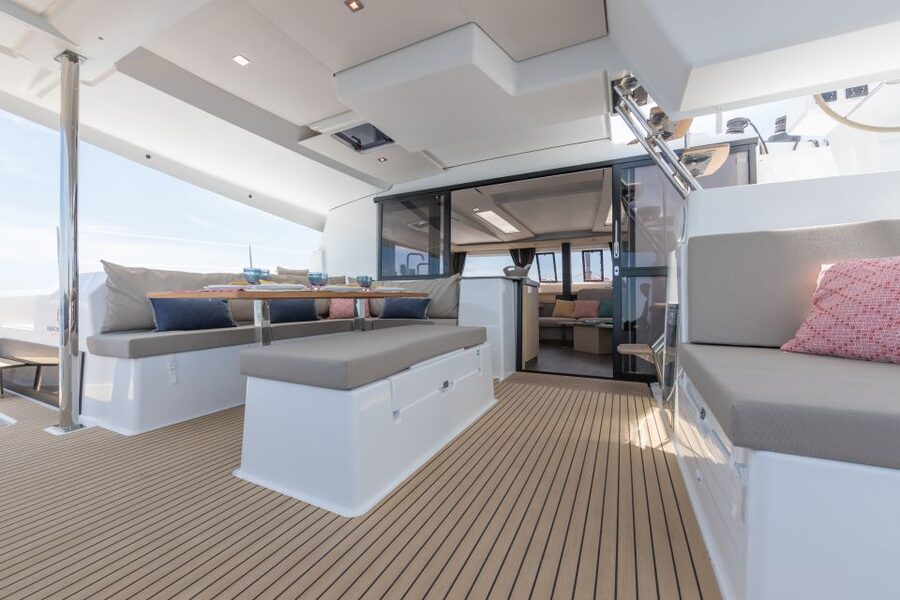 Mykonos: Catamaran Cruise with 3-Course Meal and Transfers - Transfers and logistics: the short van ride and the tender boat