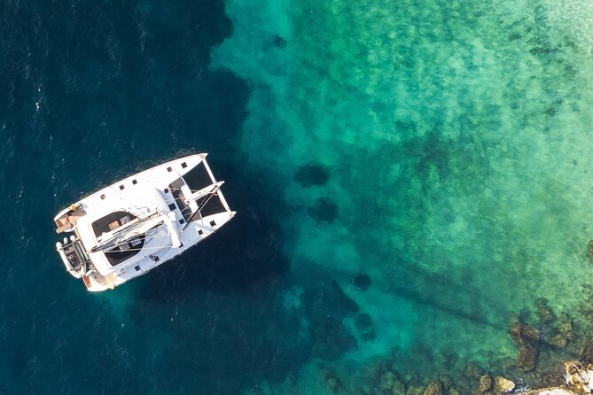 Mykonos Delos Rhenia Daily Cruise with BBQ, Drinks & Transfer - Why This Delos and Rhenia Catamaran Is a Smart Mykonos Day