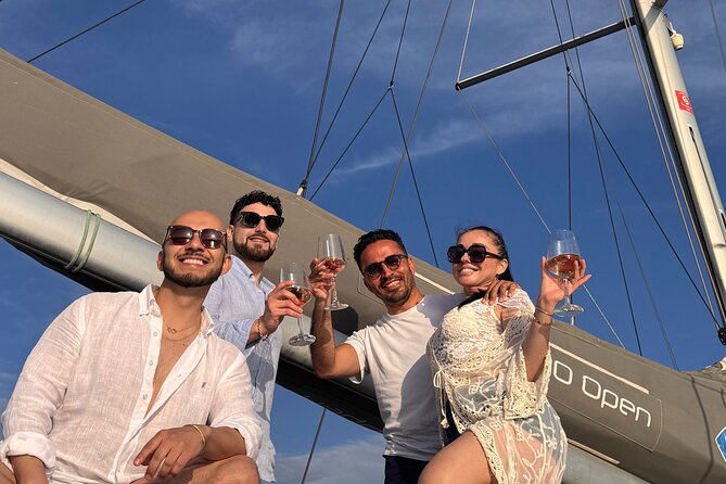 Mykonos Shared Catamaran Tour Experience - Cruising Mykonos south coast: Psarou to Super Paradise