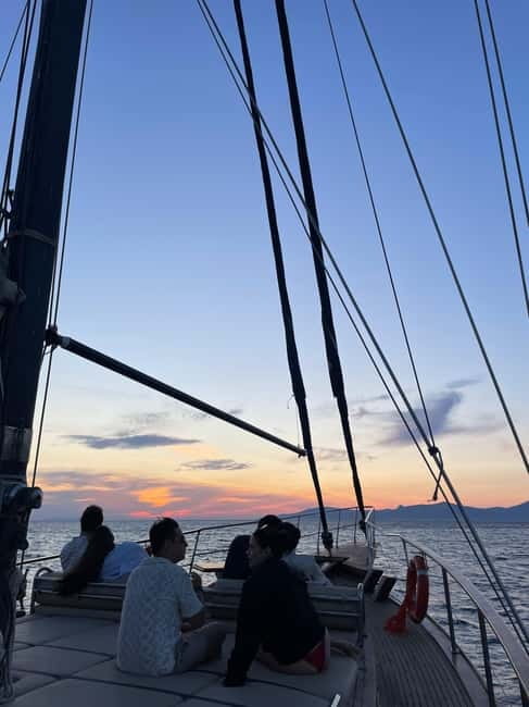 Mykonos: Sunset Boat Cruise with Light Dinner & Drinks - Entering the experience from Agios Ioannis Diakoftis