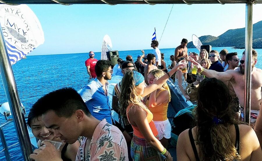 Mykonos: Sunset Boat Party with Open Bar & Live DJ - Swim stops, inflatables, and the jumping board reality check