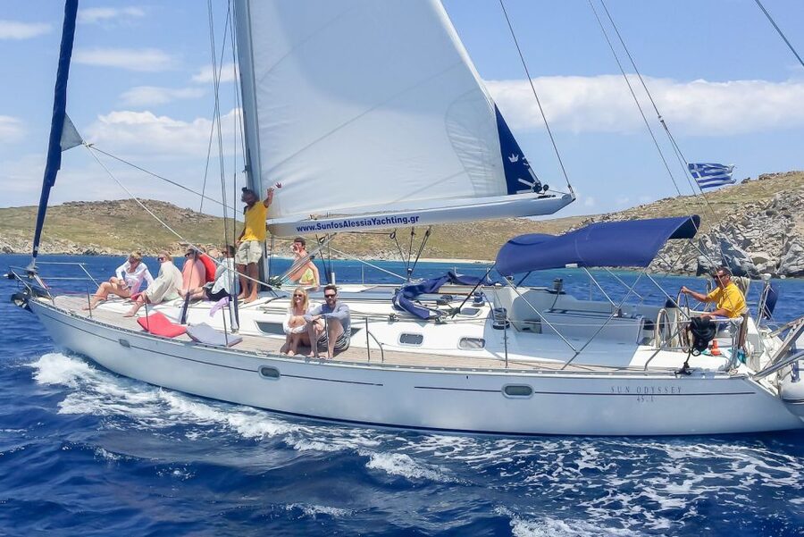 Mykonos: Yacht Cruise to Rhenia and Guided Tour of Delos - Lunch onboard on anchor: pasta, Greek salad, fruit, and wine
