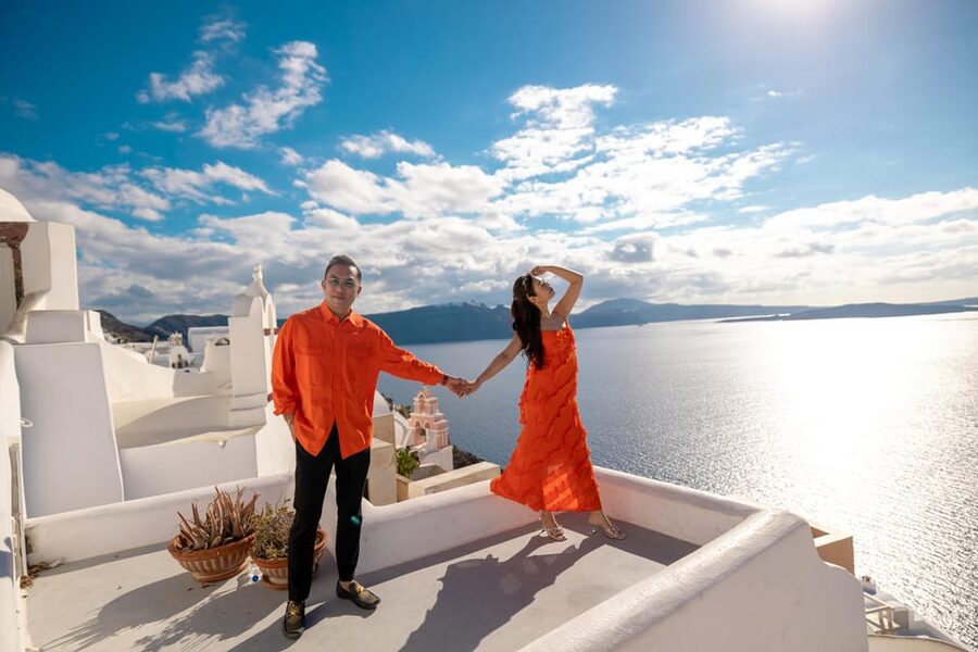 Oia: Couple photoshoot with 30 edited Photos - Flying Dress Photoshoot: Movement, Wind, and Dramatic Shots