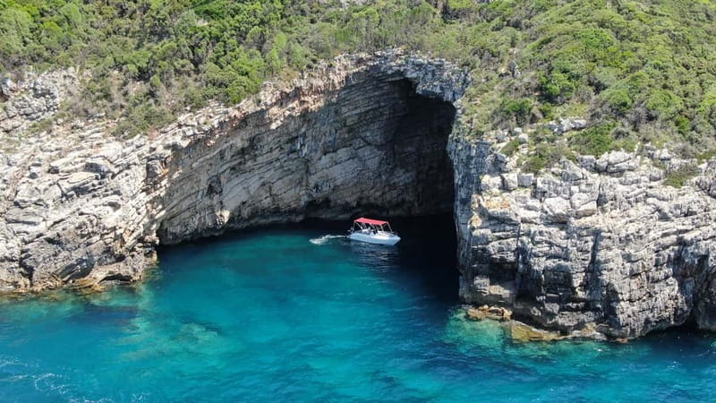 Paleokastritsa: Paradise, Yali Beach & Blue Caves Boat Tour - Paradise Beach (Chomi): a swim stop with strict rules