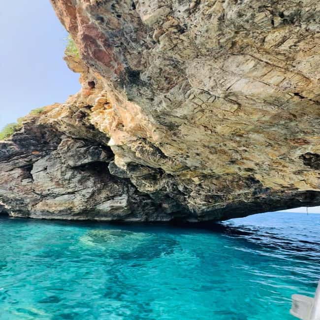 Pounta: A boat trip to the Pirate Cave - The Fira Channel Anchor Break: Wine, Prosecco, and Church-Top Views