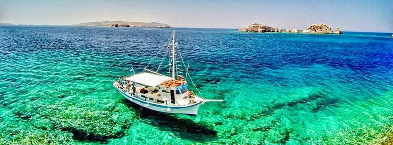 Pounta: Blue Lagoon Boat Tour - Stop One: San Nikolas Island Area, Quick Scenery, and Your First Water Time