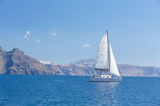 Premium Small-Group Catamaran Cruise with BBQ, Open Bar, Transfer - The Quiet Cove for Snorkeling, BBQ, and Local Wine