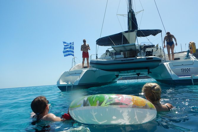 Private CATAMARAN daytrip - Lindos/ Rhodos with Lunch and drinks - The coastline cruise: Bay of Navarone and Cave Island sightings