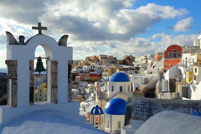 Private Classic Santorini Panorama: Visit the most popular destinations! - Oia Main Street: cliffside churches, history clues, and sunset timing