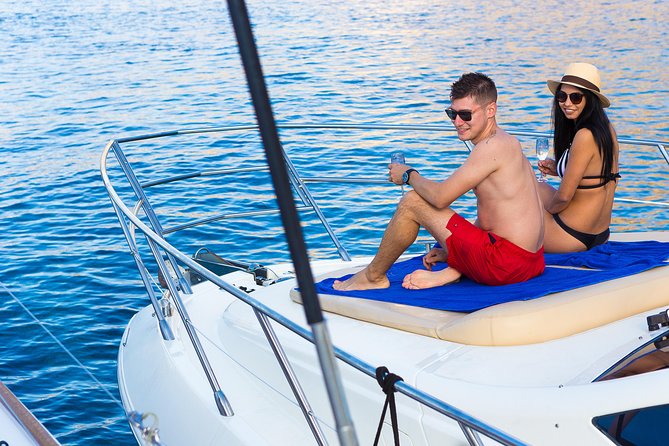 Private Motor Yacht Cruise with BBQ, Open Bar & Transfers - Who should book this private Santorini yacht cruise