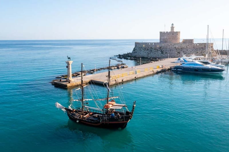 Rhodes:1-hour Sightseeing Day Cruise on an 18th-Century Boat - Onboard vibe: calm music, friendly crew, and practical comforts