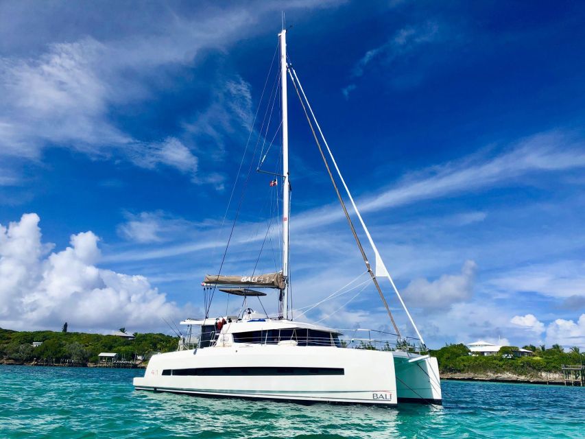 Rhodes: All-Inclusive Catamaran Cruise with Lunch and Drinks - From Mandraki Harbor to catamaran comfort