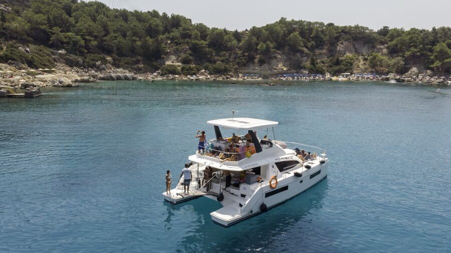 Rhodes: All-Inclusive Catamaran Cruise with Lunch and Drinks - Anthony Quinn Bay: the swim stop with fish on cue
