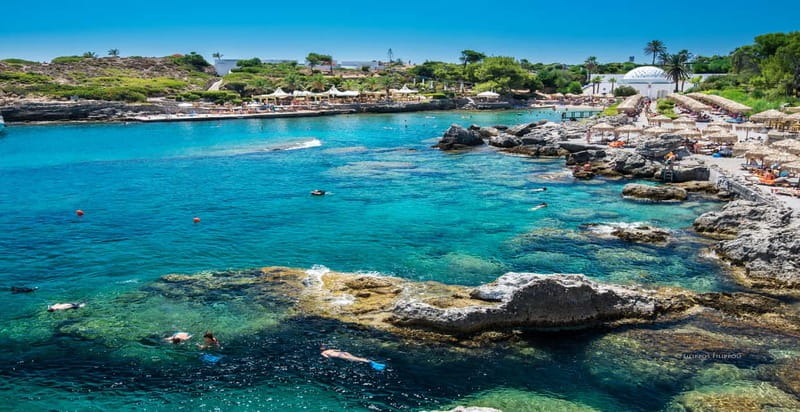 Rhodes: Anthony Quinn Bay & Sea Caves Snorkeling Cruise - Traganou’s gravel beach and the draw of hidden caverns