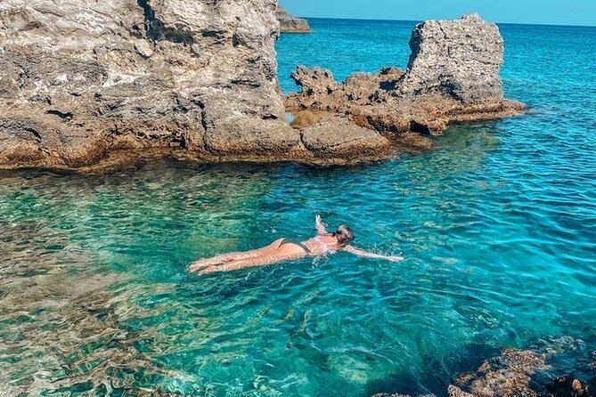 Rhodes Bay to Bay Swim Cruise-Greek Buffet w/wine included - Kallithea Springs: the reddish water moment you will remember