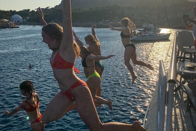 Rhodes Bay to Bay Swim Cruise-Greek Buffet w/wine included - Anthony Quinn Bay snorkeling: fishy water and jump-off energy