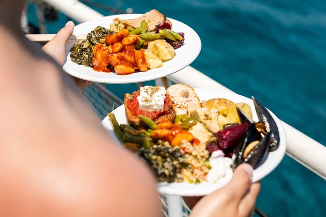 Rhodes Bay to Bay Swim Cruise-Greek Buffet w/wine included - Ladiko Bay from the boat: the oil-shipwreck clue stop