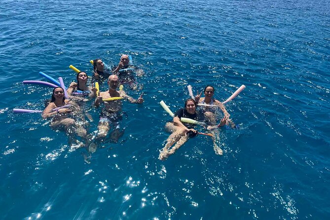 Rhodes Bay to Bay Swim Cruise-Greek Buffet w/wine included - On-board comfort: two decks, shaded seating, and clean bathrooms