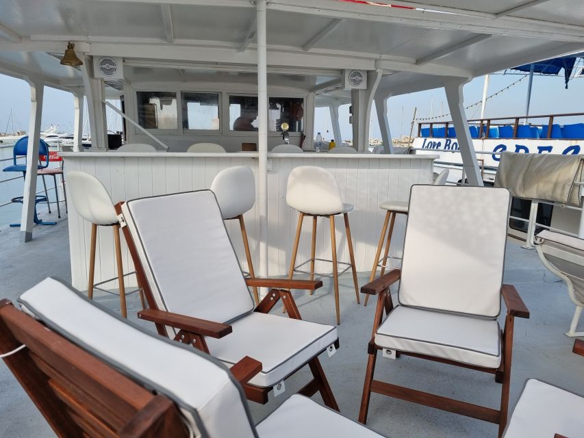 Rhodes: Bay to Bay Swim Cruise with Greek Buffet and Wine - Vibe and Service: The Social Part of the Day