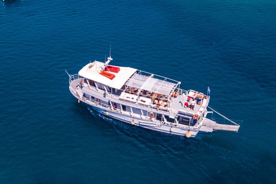 Rhodes: Bay to Bay Swim Cruise with Greek Buffet and Wine - Afandou Beach and the Caves of Traganou: Lunch-Time Energy