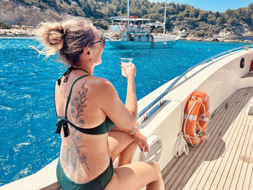 Rhodes: Beach Cruise with Swimming, Meal, & Unlimited Drinks - Old Town and Faliraki pass-by views without the hassle