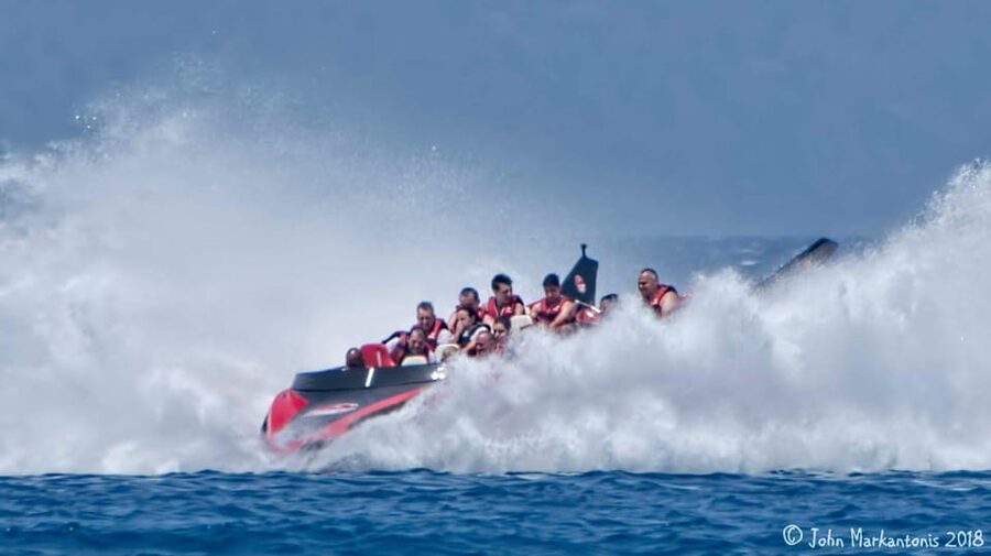 Rhodes: Beaches Trip by Jet Boat with Snorkeling and Drinks - Captain maneuvers, deck music, and the cold drinks moment