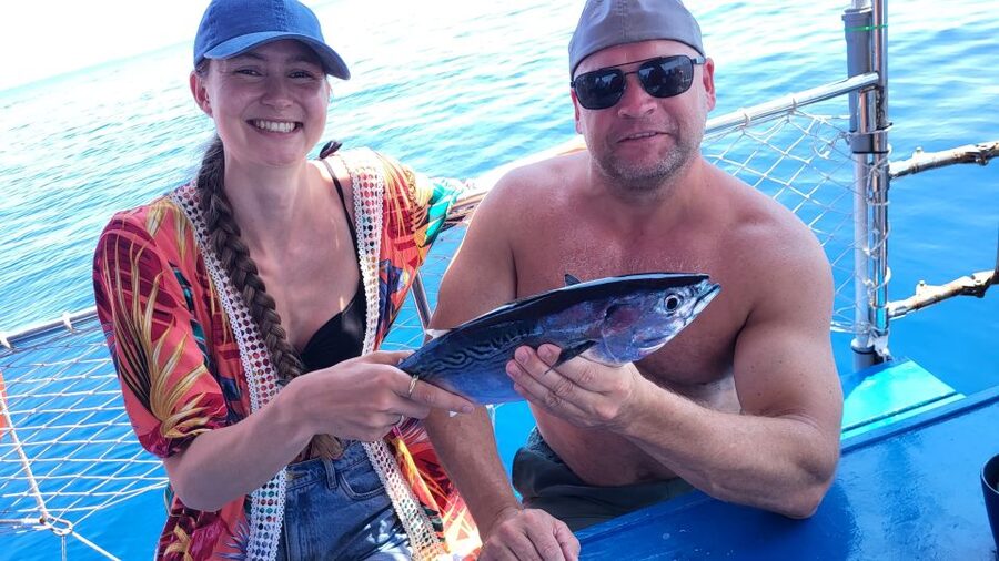Rhodes: Fishing Trip, Snorkelling, BBQ, & Professional Guide - Lunch on Board: Handmade BBQ, Greek Salad With Secret Herbs, and Fresh Fish
