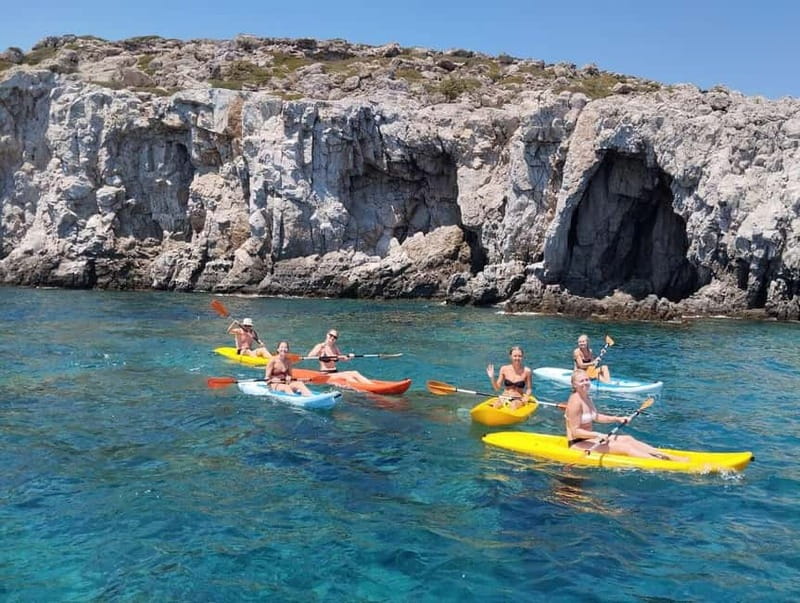 Rhodes: Gulet Trip with Food, Drinks, SUP, Kayak & Swimming - Fun Island-Ladiko: the real playground for SUP, kayaking, and floating-sofa lounging
