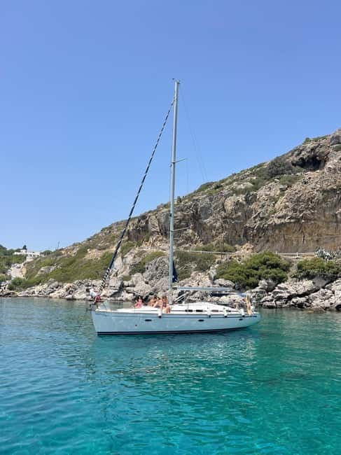 Rhodes: Sunset Catamaran Cruise with Snack, Fruits & Drinks - Comfort on Board: Cozy Seating, Space, and Crew Energy