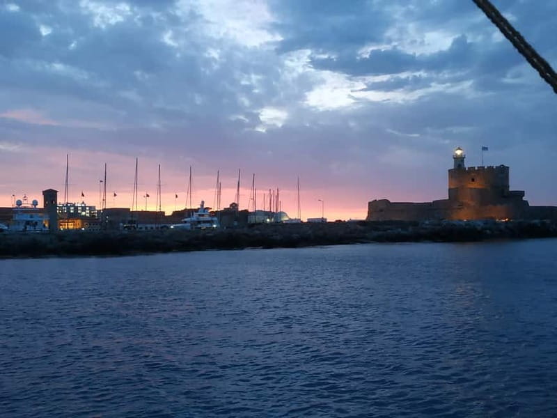 Rhodes: Sunset Cruise 1 hour on an 18th-Century Boat - Included drinks and live music moments on a short sail
