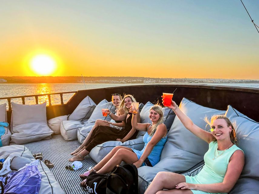 Rhodes: Sunset Cruise with Greek BBQ and Unlimited Drinks - Sunset Near Rhodes Town: Best Deck Choices and Photo Moments