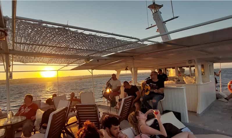 Rhodes: Sunset Cruise with Live Music, Wine & Greek Buffet - Greek Buffet + Unlimited Wine: How the value works in real life