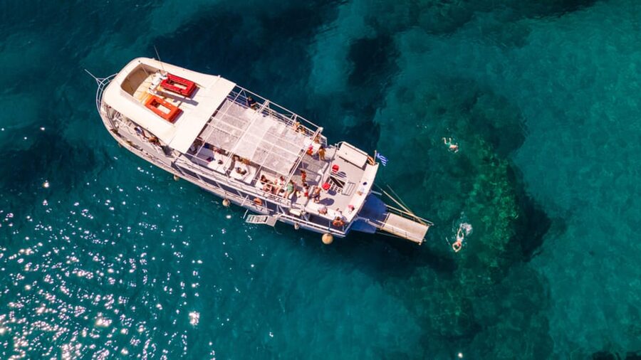 Rhodes: Sunset Cruise with Live Music, Wine & Greek Buffet - Live Music Through Sunset: The sing-along part