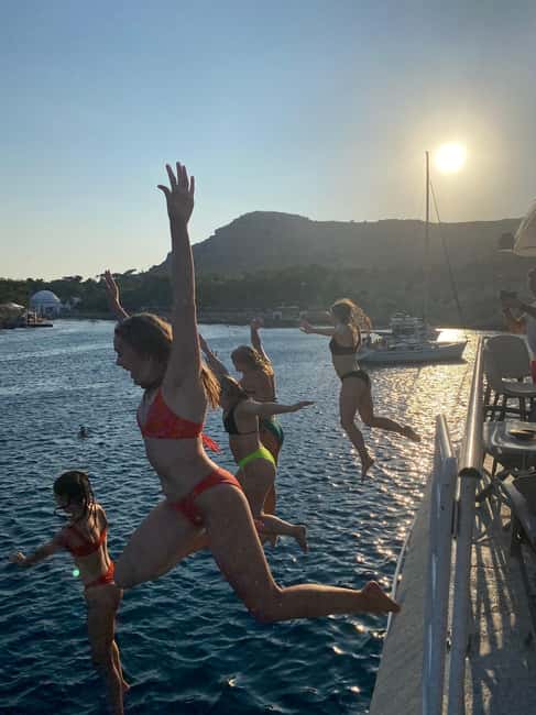 Rhodes: Sunset Cruise with Open Bar, Dinner, & Live Music - Key things I’d plan around