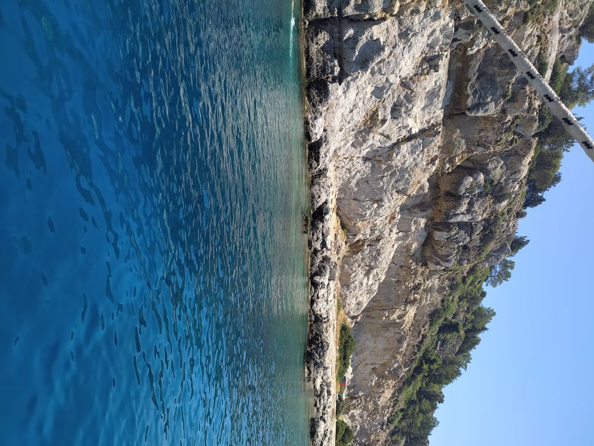 Rhodes Town: Anthony Quinn, Kalithea & Afandou Boat Cruise - Stop 2: Afandou Beach, Sun, Swim, and Snorkel With Gear