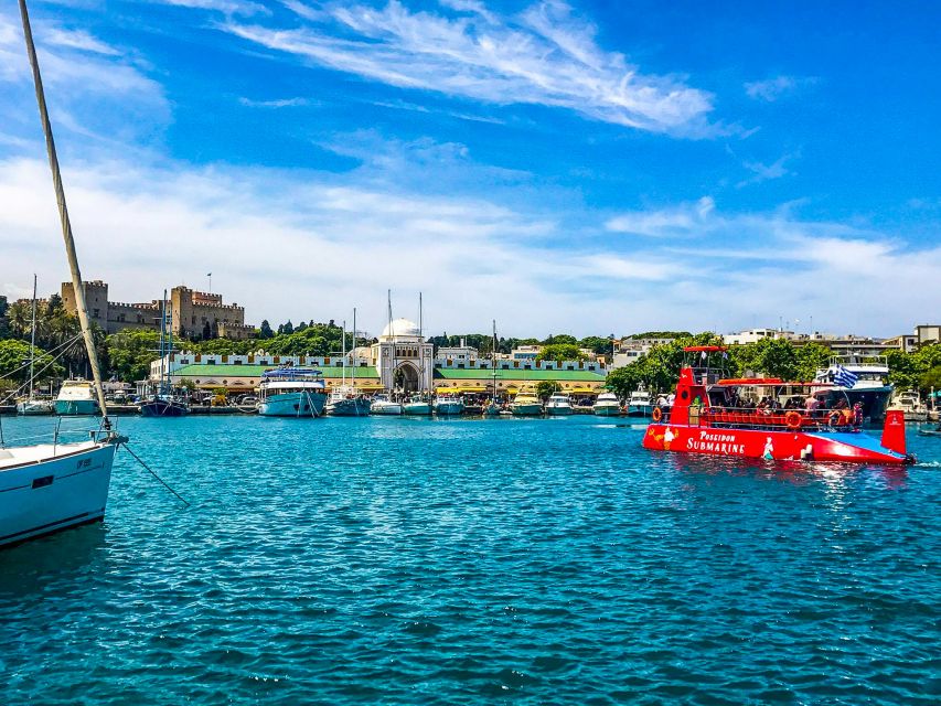 Rhodes Town: Submarine Cruise with Underwater Views - Underwater feeding time: the diver’s fish moment