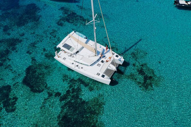 Sail the Athenian Coastline on a Catamaran with Meal & Wine - Stop 1, Nisís Idhroúsa: swim time on a tiny uninhabited island
