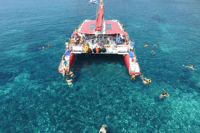 Sailing Catamaran Cruise in Santorini with BBQ, Drinks and Transfer - Stop 1, Hot Springs: A Swim Near Sulfur Waters