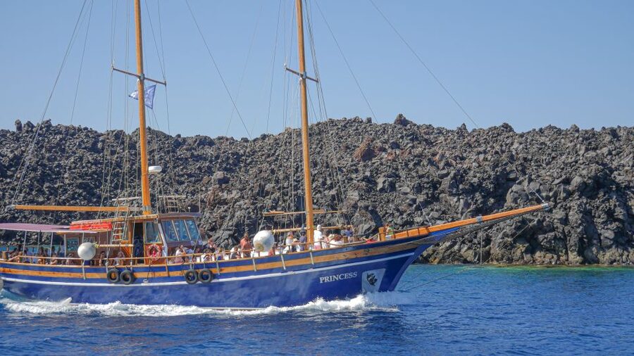Santorini 2-Day Combo: Volcano Boat Cruise & Island Bus Tour - Day 1 on the caldera: Nea Kameni crater trek and Palea Kameni hot springs