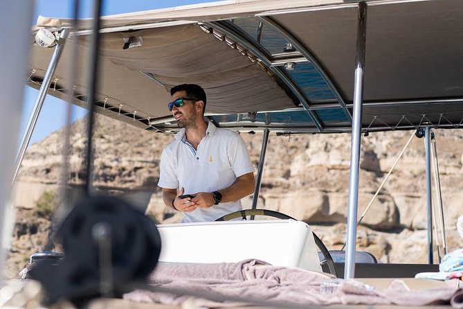 Santorini All-inclusive Catamaran Cruise with Thirassia Stop - Nea Kameni Hot Springs: Swim Time and a Real Clothing Warning