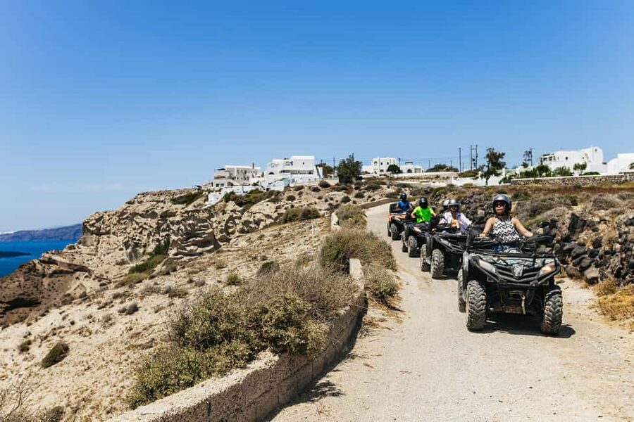 Santorini: ATV Quad Bike Tour with Lunch and Pickup - Vlichada Beach and volcanic cliffs: where the ride turns scenic, not touristy