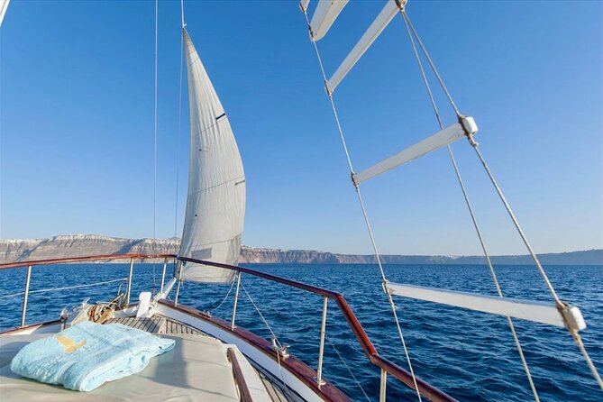 Santorini Caldera Day Traditional Cruise with Meal and Drinks - Thirassia swim and the deck lunch that keeps people smiling