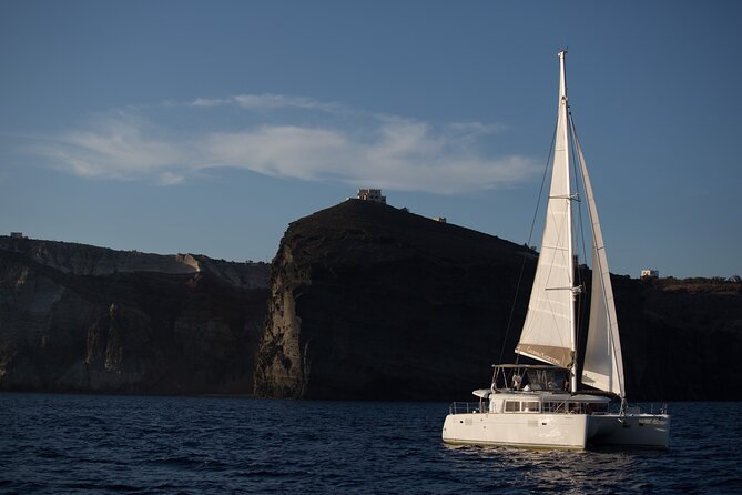 Santorini Caldera Gold Day Cruise with BBQ on board and Open Bar - Vlychada to Red Beach: the first swim-and-photo combo